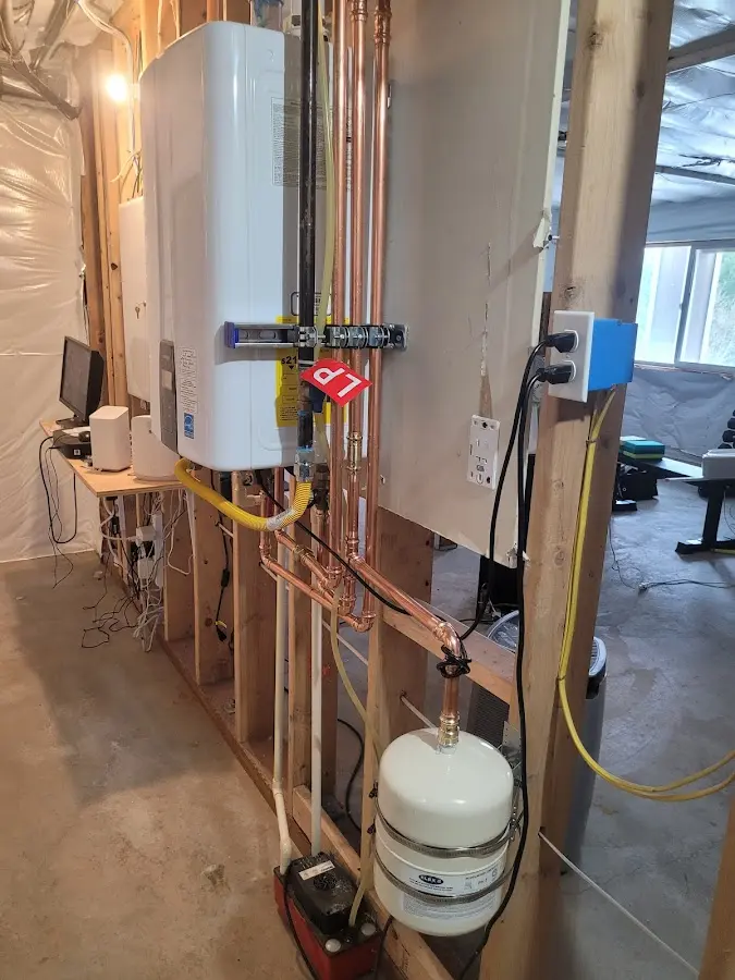 Licensed plumber repairing a kitchen sink in Kimberly