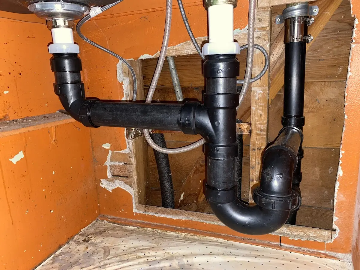 Professional Garbage Disposal Repair equipment and tools on the job in Kimberly